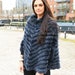 Raquel reviewed Knit Rabbit Fur Cape WIth Raccoon Fur Trim