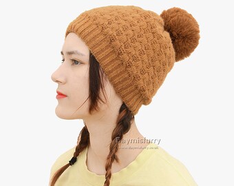 woolen head cap with pom pom