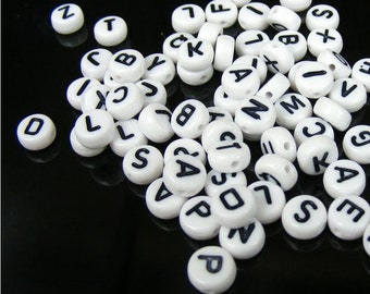 200x character Beads White/Black 7 x 4 mm