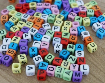 200x character beads coloured/Black 6 x 6 mm