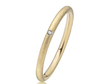 Delicate engagement ring gold diamond