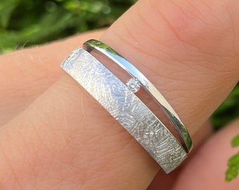 handmade engagement ring made of silver with diamond and desired engraving