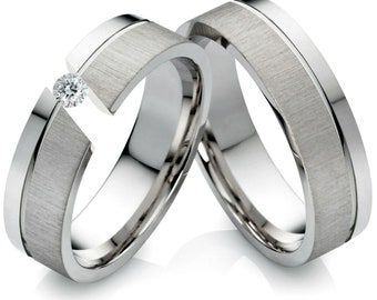 special unusual stainless steel partner rings engagement rings set