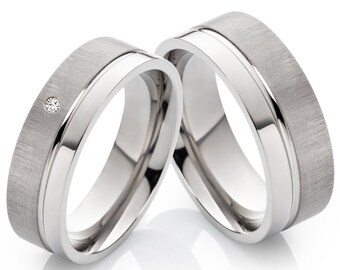Wedding rings made of titanium with diamond engraving and certificate of authenticity