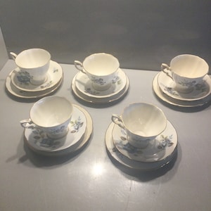 Paragon &quot;Blue Mist” English tea set: Blue roses decorate this stunning teaset, a perfect “something blue” for a wedding topper.