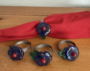 Juego de 4 servilleteros de cristal vintage de los años 90 con diseño floral único de margaritas moradas y azules.