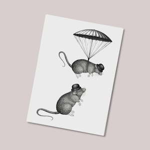Peut inclure: Une impression d'art en noir et blanc représentant deux rats portant de petits chapeaux melon noirs. Un rat est représenté debout sur le sol, tandis que l'autre est suspendu dans les airs par un grand parachute détaillé attaché à son corps.