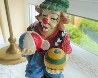 Clown, Clownfigur mit Fussball, Bällen