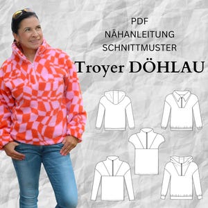 Puede incluir: Patrón de costura PDF e instrucciones para un suéter "Troyer Döhllau". El patrón incluye cinco estilos diferentes de suéteres con una variedad de cuellos y longitudes de mangas.