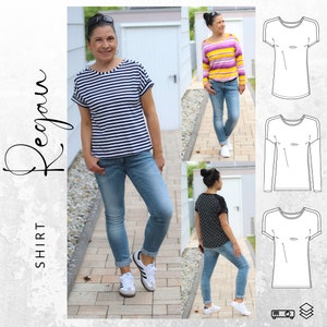 Può includere: Una donna indossa una maglietta a righe con le maniche arrotolate e jeans blu. La maglietta ha un girocollo e una vestibilità rilassata. L'immagine mostra anche tre disegni a linea della maglietta in diversi stili: maniche corte, maniche lunghe e maniche corte con un diverso design delle maniche.