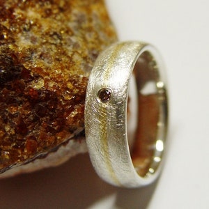 Ring in silver and gold with brilliant