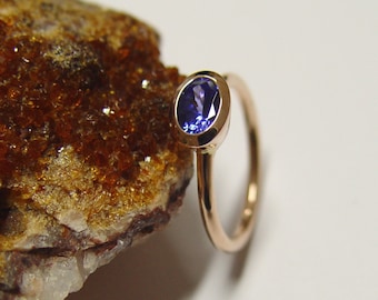 Bague en or rose avec tanzanite