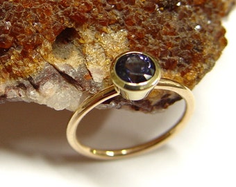 Gold ring with iolite - water sapphire