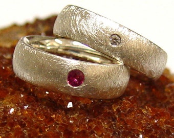 Wedding rings in silver with brilliant and ruby