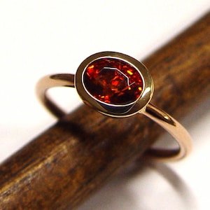 Ring in Gold mit Mandarin-Granat Bild 1