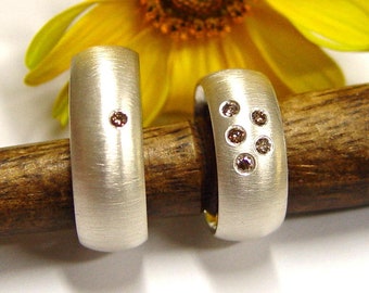 Wedding rings in silver with brilliant hand forged