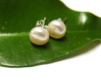 Stud earrings  Jacqueline Herzog pearl witchcraft