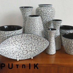1/9 Cortina ceramic pieces in black and white