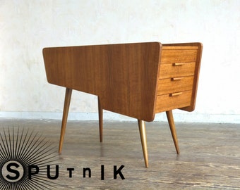 Stylish, asymmetrical cabinet from the 50s