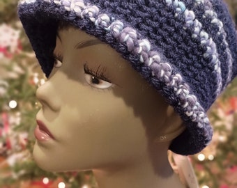 Hand crocheted hat in purple made with farm -raised llama fiber, silk and merino yarn