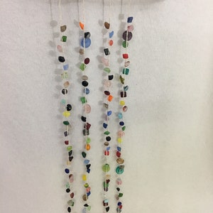 Mobile, spatial object. Wind chime driftwood with glass buttons