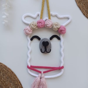 A handmade door ornament to hang on the door of your newborn or child's room