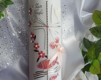 May include: White baptism candle with silver and pink decorations. The candle features a cross, a dove, a fish, and a floral design. The text "Zur Taufe" and "Lena 22.11.18" is inscribed on the candle.