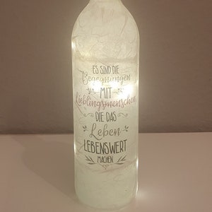 Light bottle, bottle with light, saying