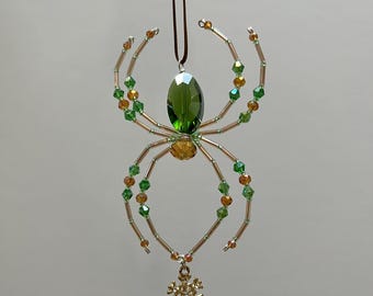 Araña navideña de cristal con tarjeta de cuento