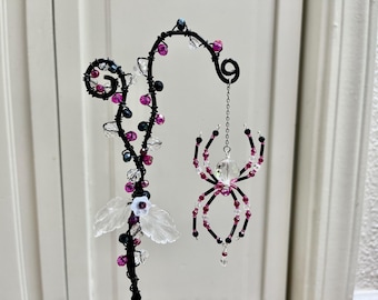 Twisted wire and beaded spider plant stake