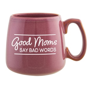 May include: A burgundy ceramic coffee mug with a white handle and the text "Good Moms Say Bad Words" printed on the front.