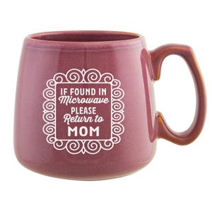 May include: A pink ceramic mug with a white design that says "If found in microwave please return to MOM".