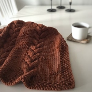 Knitted blanket with a stylish braid pattern, a warm and thin woolen plaid, a vintage style home decoration to throw on the sofa or bed.