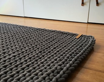 Chunky rectangular rug, crochet carpet with a minimalist simple design, indoor and outdoor decoration, esthetic living room accent.