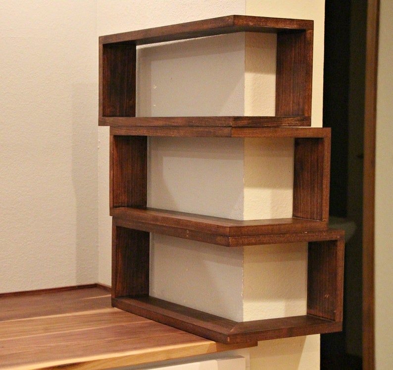 Custom floating wrap around shelves with mitred corners