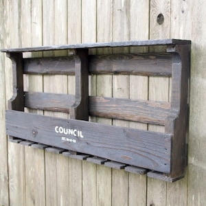 Rustic 8-bottle wine rack with 8 glass groove holder and top shelf. Handmade item
