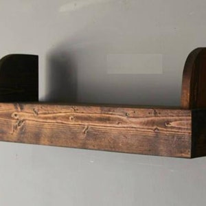 Fireplace floating shelf with book support