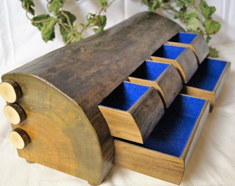 Large jewelry box made from a pine trunk.