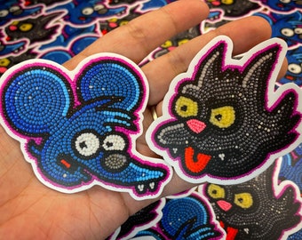 Itchy and scratchy stickers (pair)