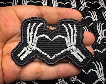 Heart shaped skeleton hands patch