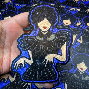 Wednesday Addams vinyl sticker