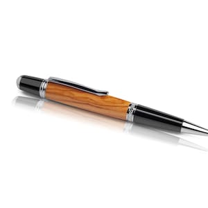 Handmade ballpoint pen made of olive wood