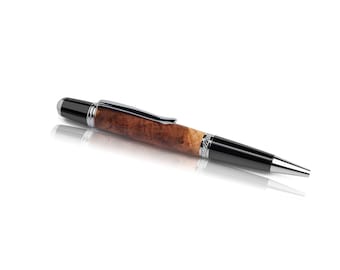 Handmade ballpoint pen made of grapevine wood