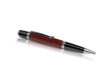 Handmade ballpoint pen made of mahogany wood