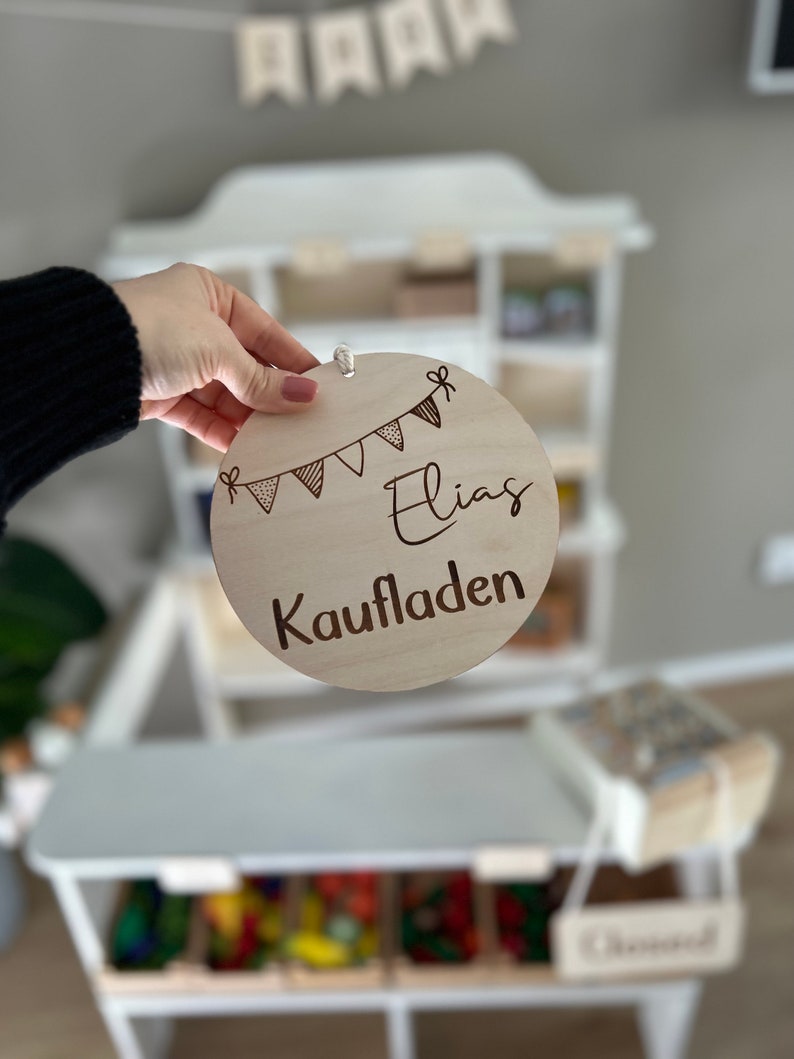 Kaufladen Holzscheibe mit Name Bild 1