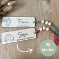 Kommunion Lesezeichen mit Name personalisiert | 35 Motive | Holz mit Band und Perlen | Geschenkidee zur Kommunion product logo