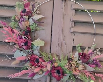 Door wreath made of dried flowers