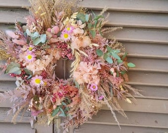 Door wreath or table wreath made of dried flowers