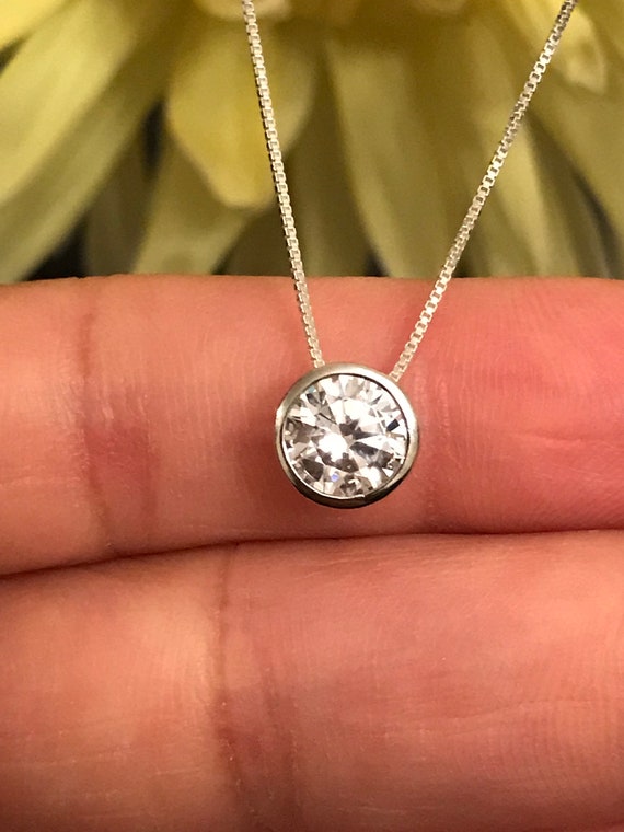 Cubic Zirconia Solitaire Necklace with Chain Included Bezel Set Sterling Silver Cubic Zirconia Solitaire Necklace with Chain Included Bezel Set Sterling Silver