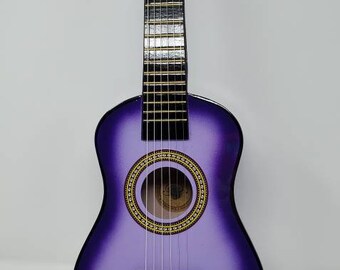 purple toy guitar